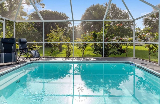Relaxing 4 bedroom home with heated Pool