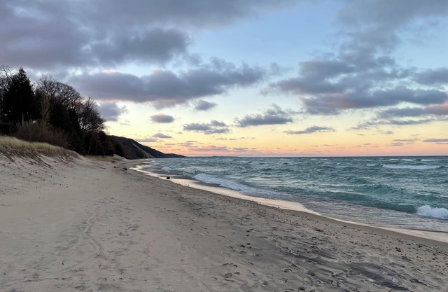 Come enjoy the seasons at this cozy northern retreat just off Lake Michigan.