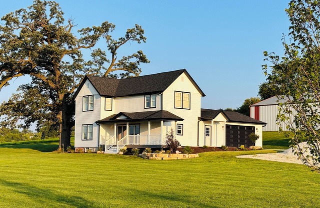 Available & Close to the John Deere Classic! Brand New 3 bed-3 bath Farmhouse!