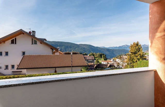 Résidence Diana Appartement 101 avec vue sur les montagnes, balcon et Wi-Fi.