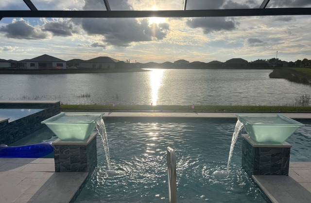Resort Like Retreat ! Inground heated pool/hot tub/large lanai and much more!