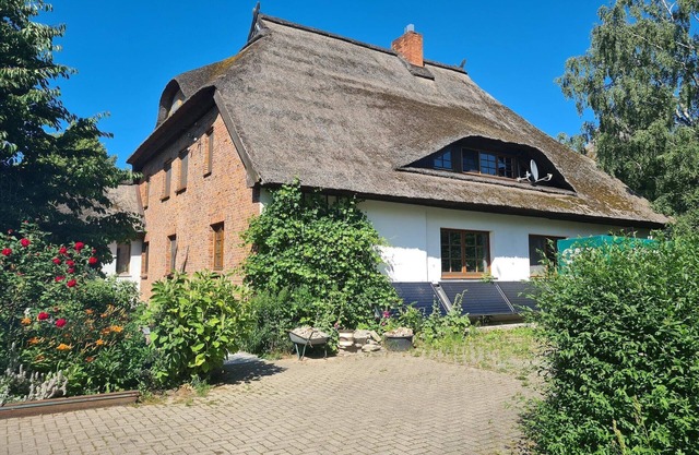 Bel appartement dans une ferme au toit de chaume