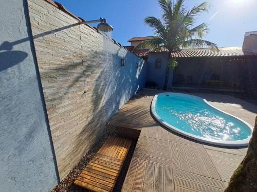 RiqueHouse: Piscina, churrasqueira a 500m da praia