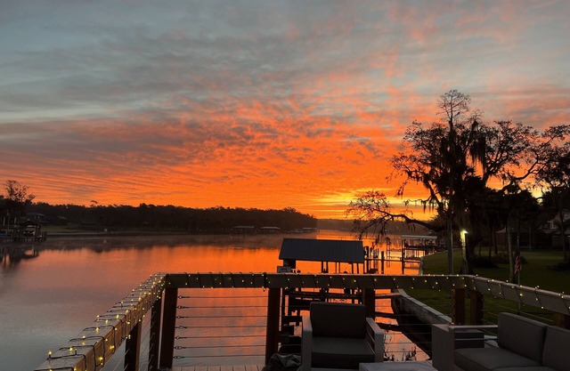 River House w/ 2-story dock, boat ramp, fire pits outdoor lounge area.