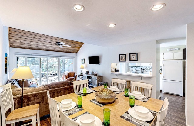 Riverfront condo with lake access, views, deck, washer/dryer, community firepit
