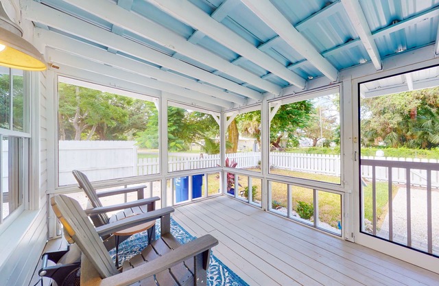 Riverfront dog-friendly cottages with kayaks, dock, patio, grill, & water views