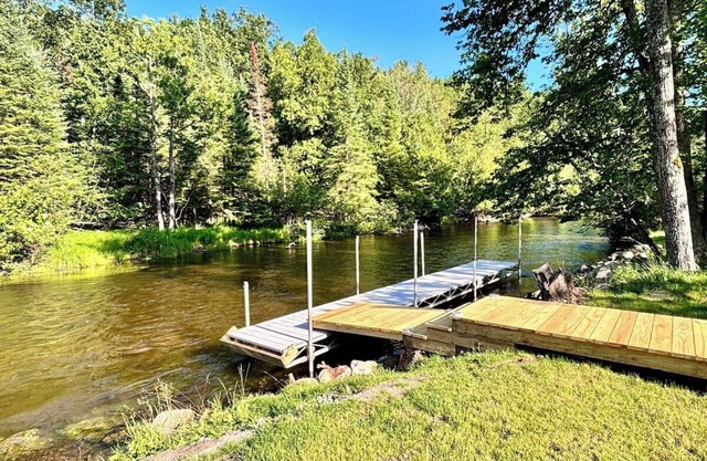 Riverfront Retreat in Kingsley with Hot Tub