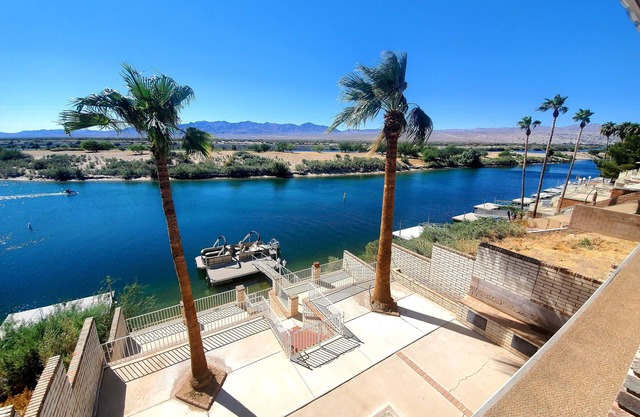 Colorado River front house, two level, boat ramp,dock, beach, and private cove.