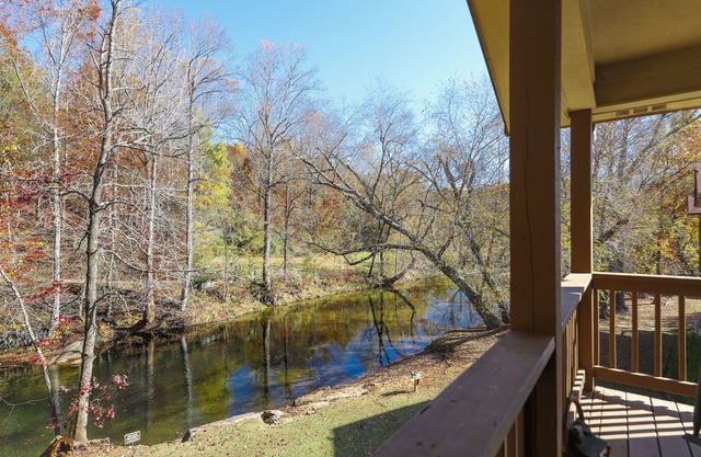 Riverfront oasis with dual suites, 3 fireplaces, central AC, & walkable locale