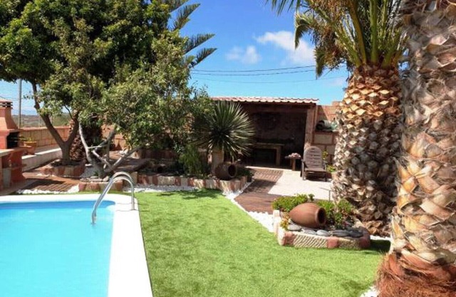 Maison de campagne historique et romantique avec jardin tropical