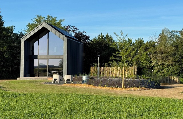 Lodge romantique à Durbury avec spa