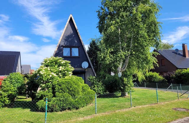 Maison à Cruck au bord de la mer du Nord juste derrière 1 digue, jardin clôturé