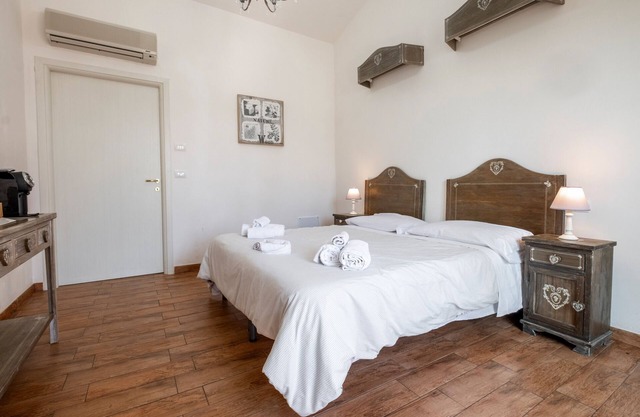 Chambre "Alloro" avec piscine partagée, Wi-Fi et climatisation