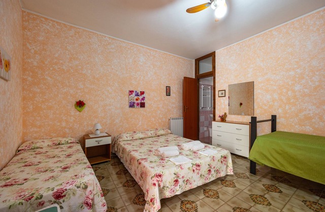 Chambre 'Appartamento 1 - Stanza 12' avec Terrasse partagée, Wi-Fi et Climatisation
