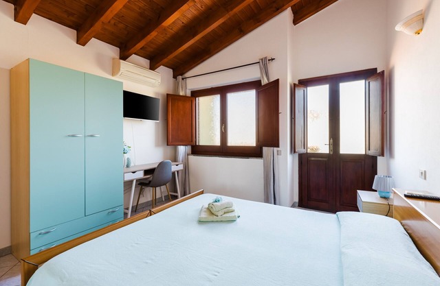 Chambre "Camera 4" avec terrasse partagée, Wi-Fi et climatisation