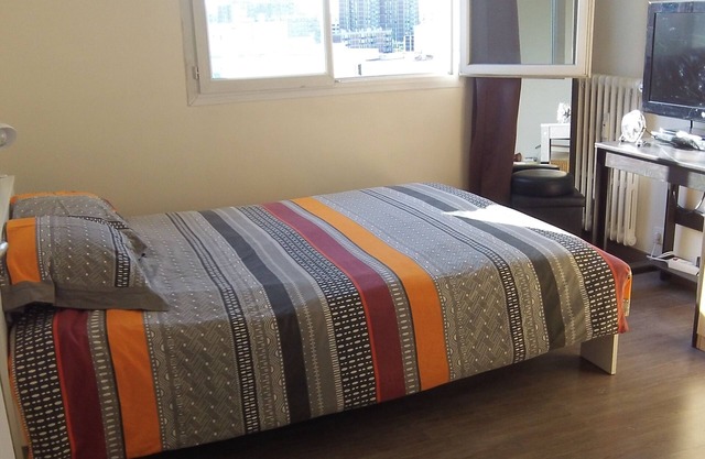 Chambre à louer dans un appartement, avec place de parking sécurisée