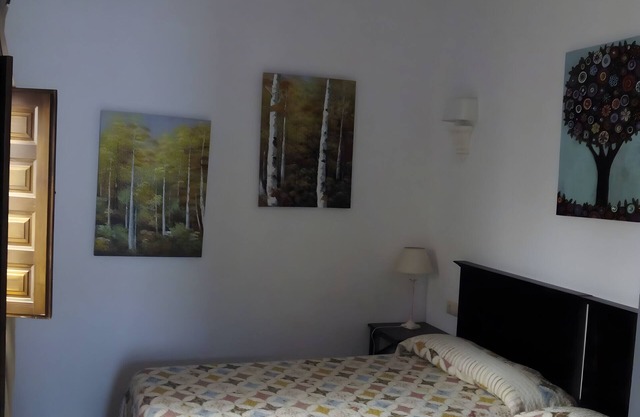 Chambre "Habitación 7" avec jardin privé, Wi-Fi et climatisation