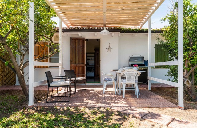 Chambre 'Melograno' avec jardin privé et climatisation