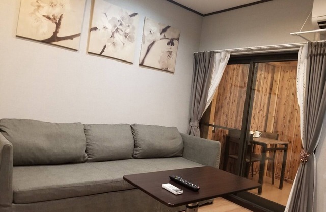 Room on the first floor with a separate Japanesestyle room kitchen and 4 Japanesestyle futons / Kyoto Kyōto
