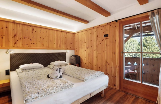 Chambre "Orange" avec terrasse partagée, jardin partagé et Wi-Fi