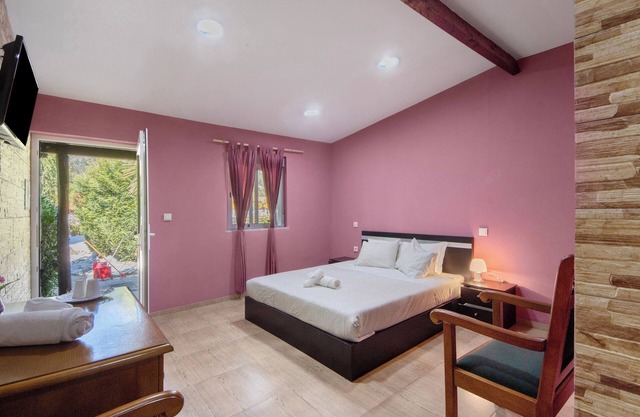 Chambre 'Quarto 9 - Gojim Casa Rural' avec vue montagne, piscine partagée et Wi-Fi