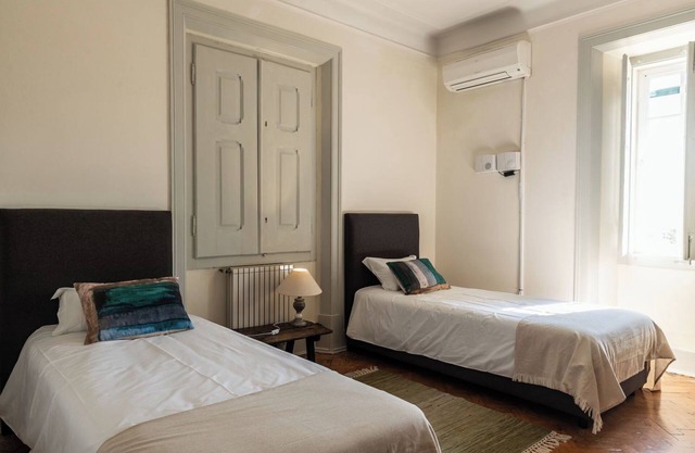 Chambre 'Quarto Twin Com Casa De Banho Privativa 2' avec Piscine partagée, Wi-Fi et Climatisation