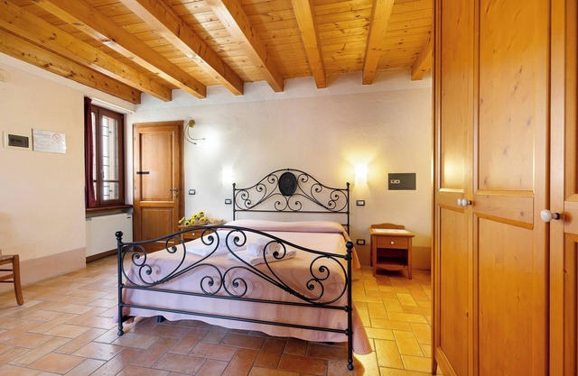 Chambre "Rosa" avec jardin partagé, Wi-Fi et climatisation