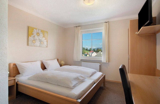 Chambre 'Zimmer 3 - Doppelzimmer' avec vue sur la montagne, terrasse partagée et Wi-Fi