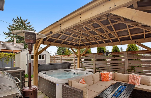 Roomy, dog-friendly home with private hot tub, fireplaces, decks & living spaces