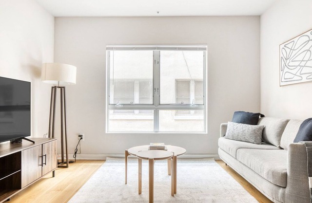 Roomy Downtown 2BR w/ Pool, W/D & Gym, near 7th St Metro, by Blueground