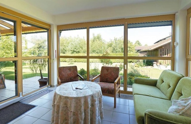Appartement calme avec terrasse spacieuse et jardin d'hiver
