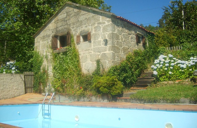 Maison rurale du XVIIIe siècle, surplombant l'estuaire d'Aldán.