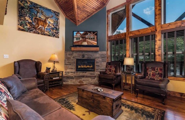 RUSTIC CABIN with 7 Master Suites!! By Pool!