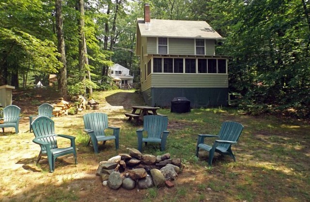 Rustic classic Maine cottage with 450' of shared sandy beach on Little Sebago