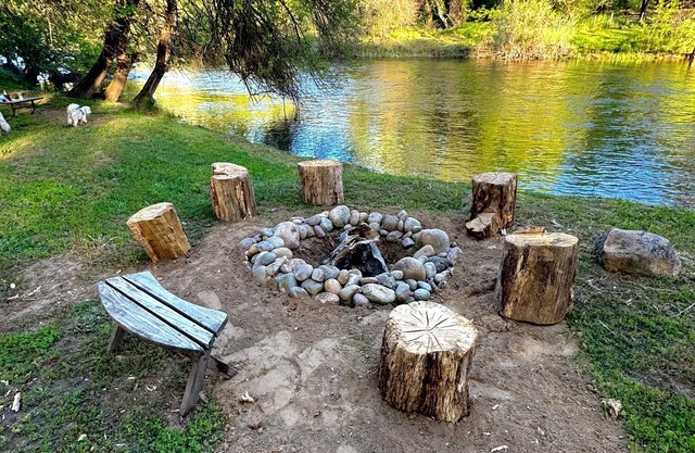 Rustic cozy cabin on rivers edge
