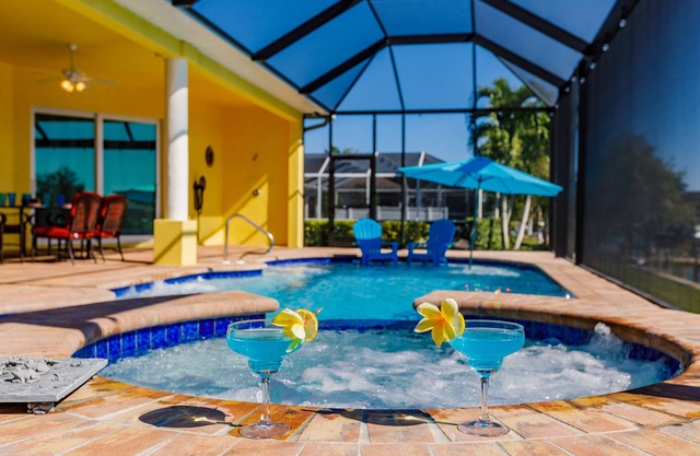 Scenic water view. 2 master suites with direct pool access. Villa Casa Amarilla
