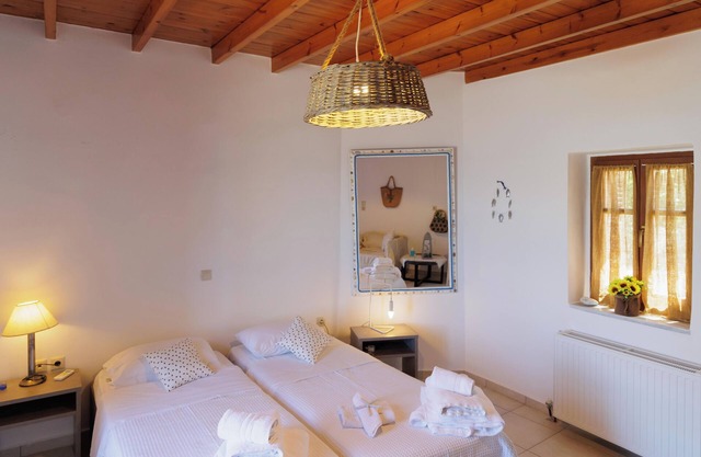 Maisonnette pour 8 personnes en front de mer à Neo Itilo