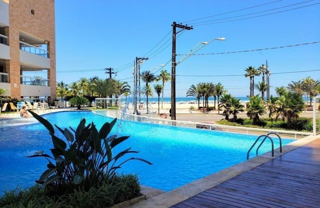 Maravilloso apartamento frente al mar con balcón gourmet (piso alto)
