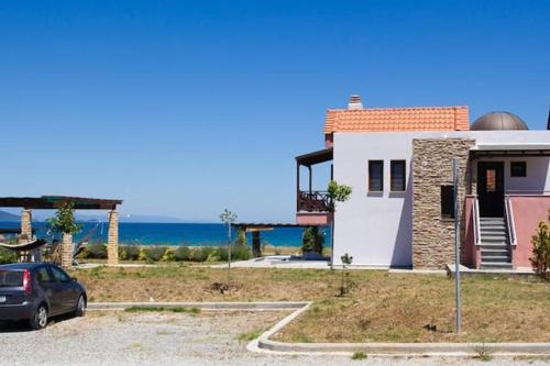Seafront house with garden
