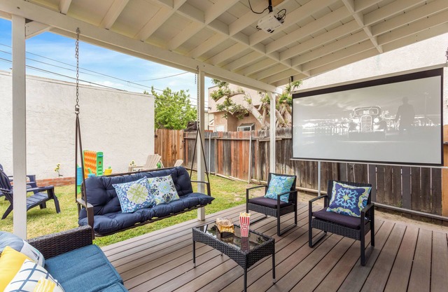 Seaside Serenity: Beach House with Outdoor Cinema