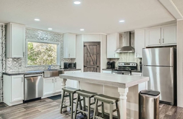 Secluded Country Home on 15 Acres with a BBQ and Upscale Kitchen. Close to COTA and the Airport.