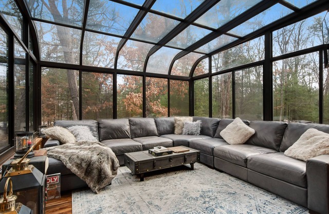 Secluded home near the lake with huge sunroom, firepit, gas grill, & private W/D