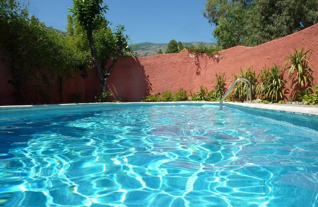 Secluded cottage with views, large private pool, edge of town