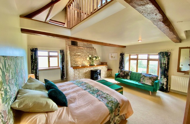 Secluded luxury farmhouse with hot tub, open fires, large garden & amazing views