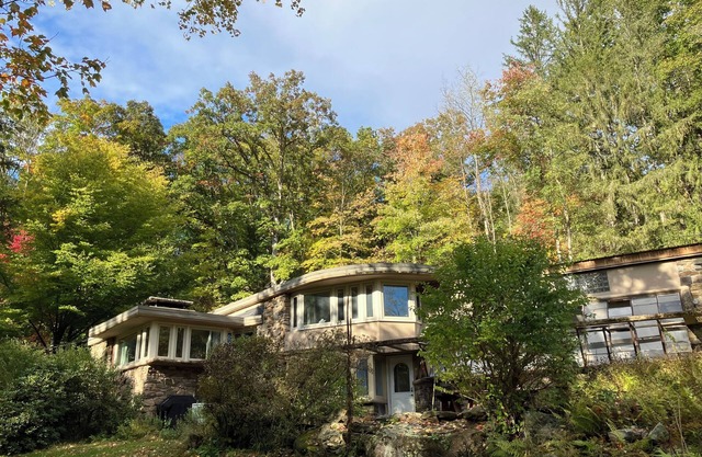 Secluded, organic modern 3-bedroom home in wooded setting.