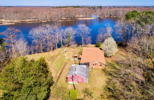 Riverfront newly renovated brick home secluded with Private Boat Doc and Pier
