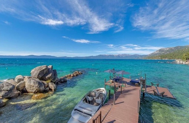 Secluded Lakefront Estate in Secret Harbor is a Luxurious Beachfront Compound