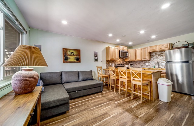 Second-floor condo with fireplace, hot tub & indoor pool - dog-friendly