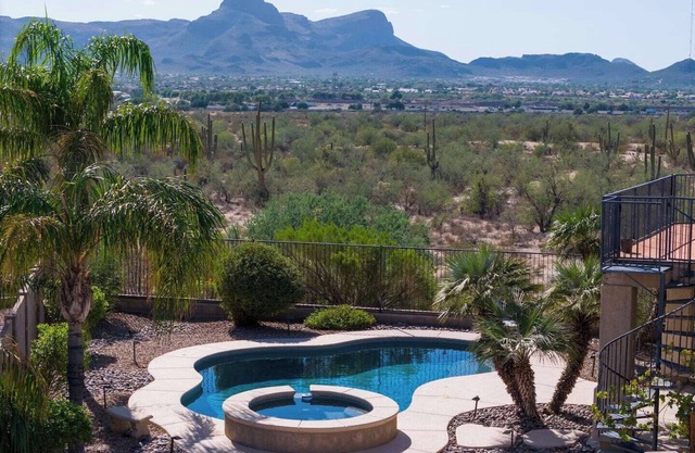 Serene desert escape with stunning mountain views, and private heated pool/spa.