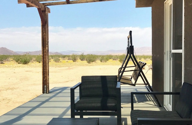 “Shangri-La” Mid-Century Mod Cabin with cowboy hot tub and sunset mountain views